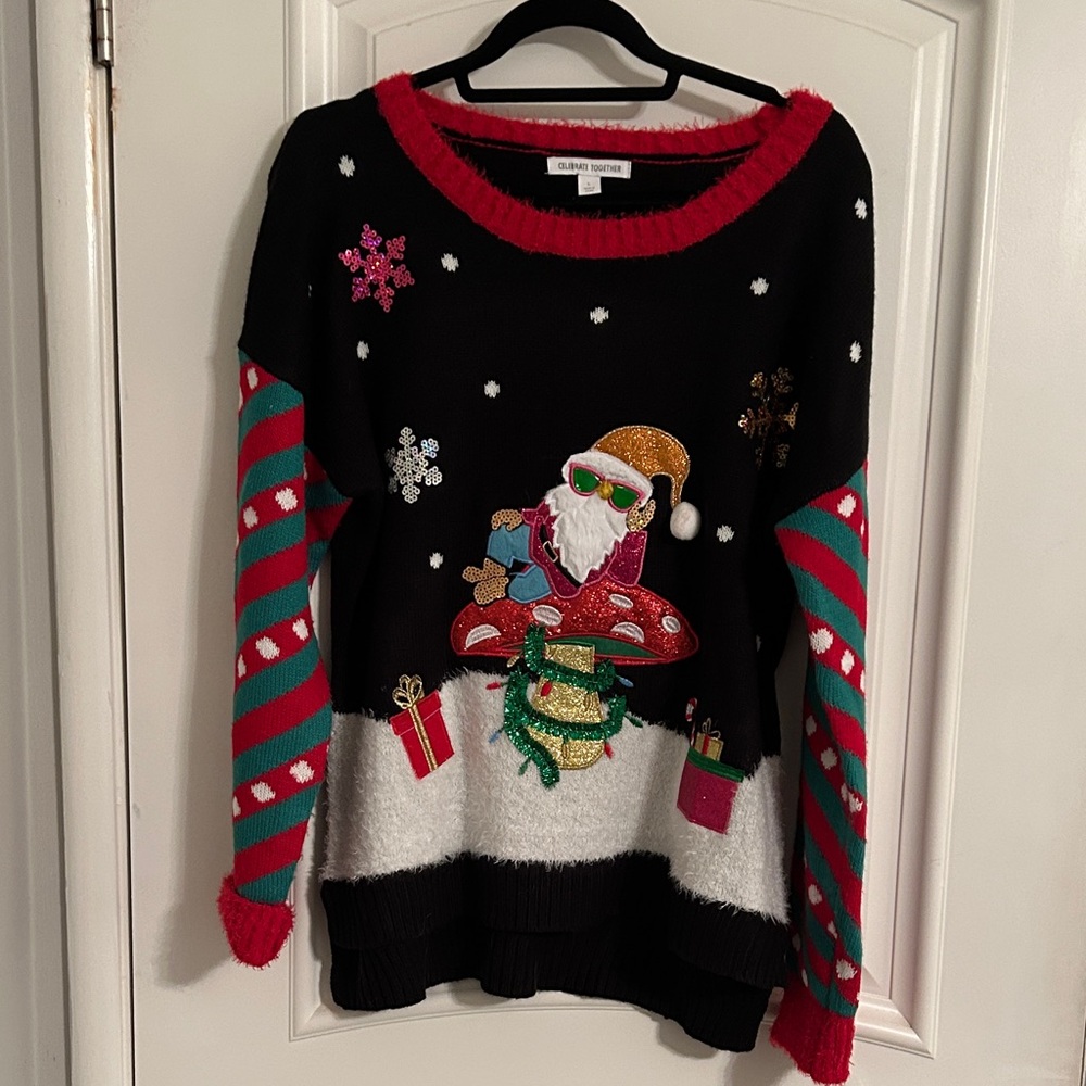 Festive Santa Sweater with Red and Green Stripe sleeves and Santa design.